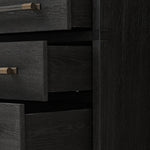 Beautifully minimalist. A three-drawer dresser made from black-finished ash  features long, linear bronzed hardware for a smooth, clean look Amethyst Home provides interior design, new home construction design consulting, vintage area rugs, and lighting in the Boston metro area.