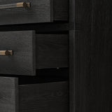 Beautifully minimalist. A three-drawer dresser made from black-finished ash  features long, linear bronzed hardware for a smooth, clean look Amethyst Home provides interior design, new home construction design consulting, vintage area rugs, and lighting in the Boston metro area.