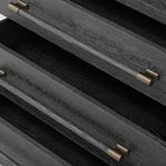 Beautifully minimalist. A three-drawer dresser made from black-finished ash  features long, linear bronzed hardware for a smooth, clean look Amethyst Home provides interior design, new home construction design consulting, vintage area rugs, and lighting in the Dallas metro area.
