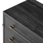 Beautifully minimalist. A three-drawer dresser made from black-finished ash  features long, linear bronzed hardware for a smooth, clean look Amethyst Home provides interior design, new home construction design consulting, vintage area rugs, and lighting in the Des Moines metro area.