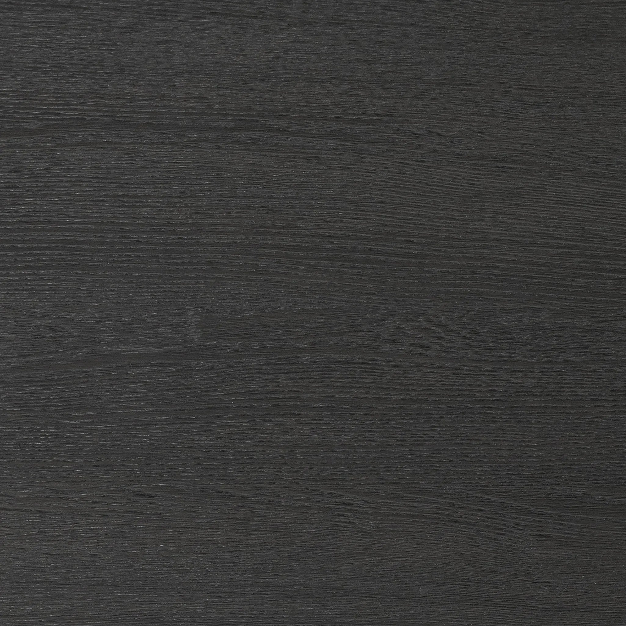 Beautifully minimalist. A three-drawer dresser made from black-finished ash  features long, linear bronzed hardware for a smooth, clean look Amethyst Home provides interior design, new home construction design consulting, vintage area rugs, and lighting in the Washington metro area.