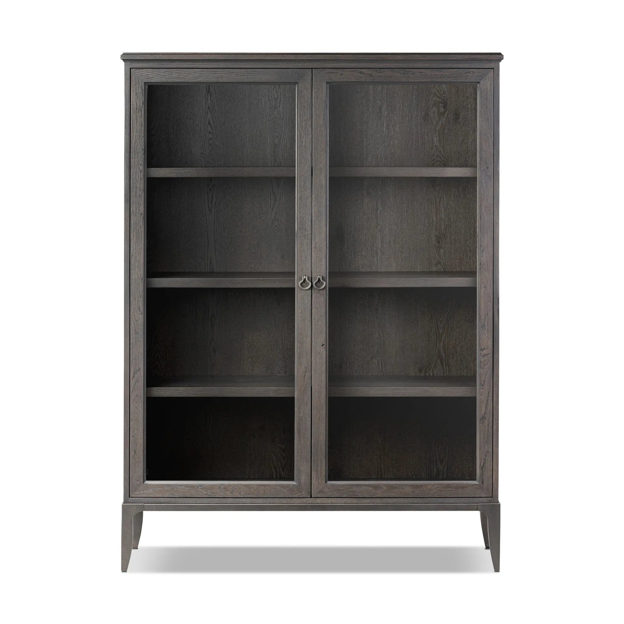Baroque-period detailing gives this oak cabinet its  classic look. Made from black oak with a metal base and ring pulls, as well as cabriole-like legs to soften the lines Amethyst Home provides interior design, new home construction design consulting, vintage area rugs, and lighting in the Winter Garden metro area.