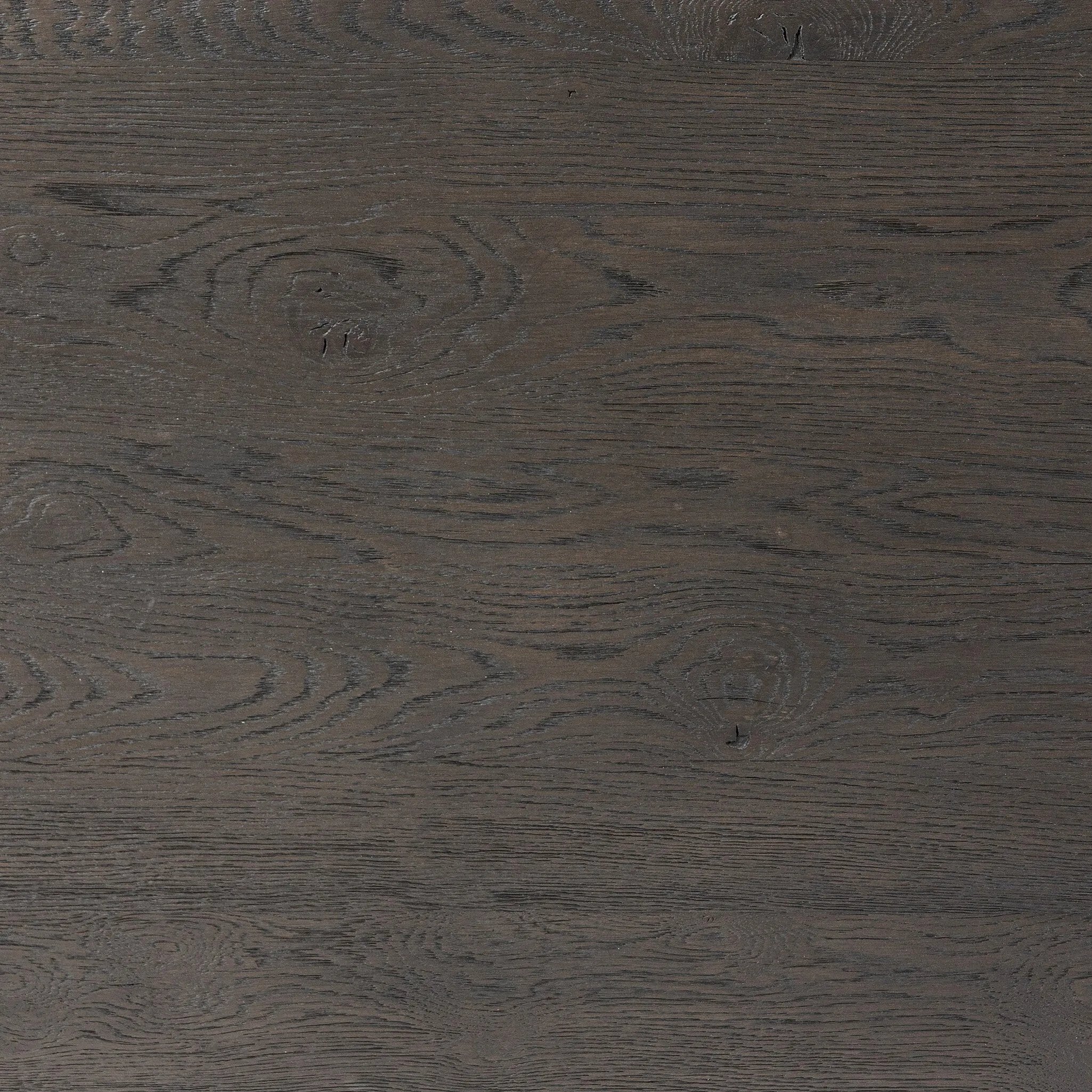 Baroque-period detailing gives this oak desk its  classic look. Made from worn black oak with metal ring pulls on its four drawers, as well as cabriole-like legs to soften the lines Amethyst Home provides interior design, new home construction design consulting, vintage area rugs, and lighting in the Scottsdale metro area.
