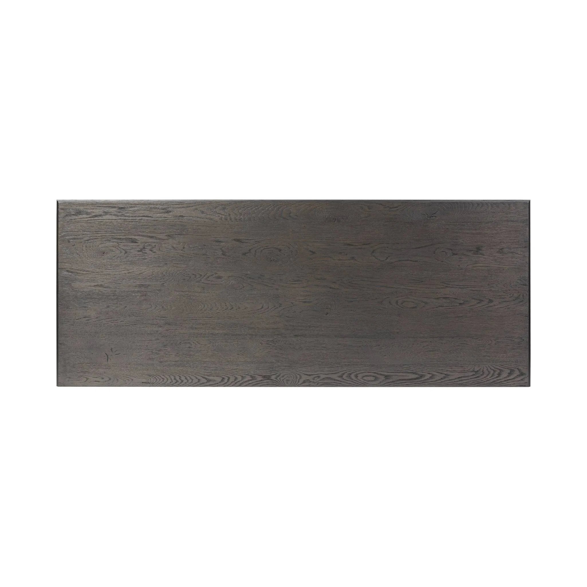 Baroque-period detailing gives this oak desk its  classic look. Made from worn black oak with metal ring pulls on its four drawers, as well as cabriole-like legs to soften the lines Amethyst Home provides interior design, new home construction design consulting, vintage area rugs, and lighting in the Seattle metro area.