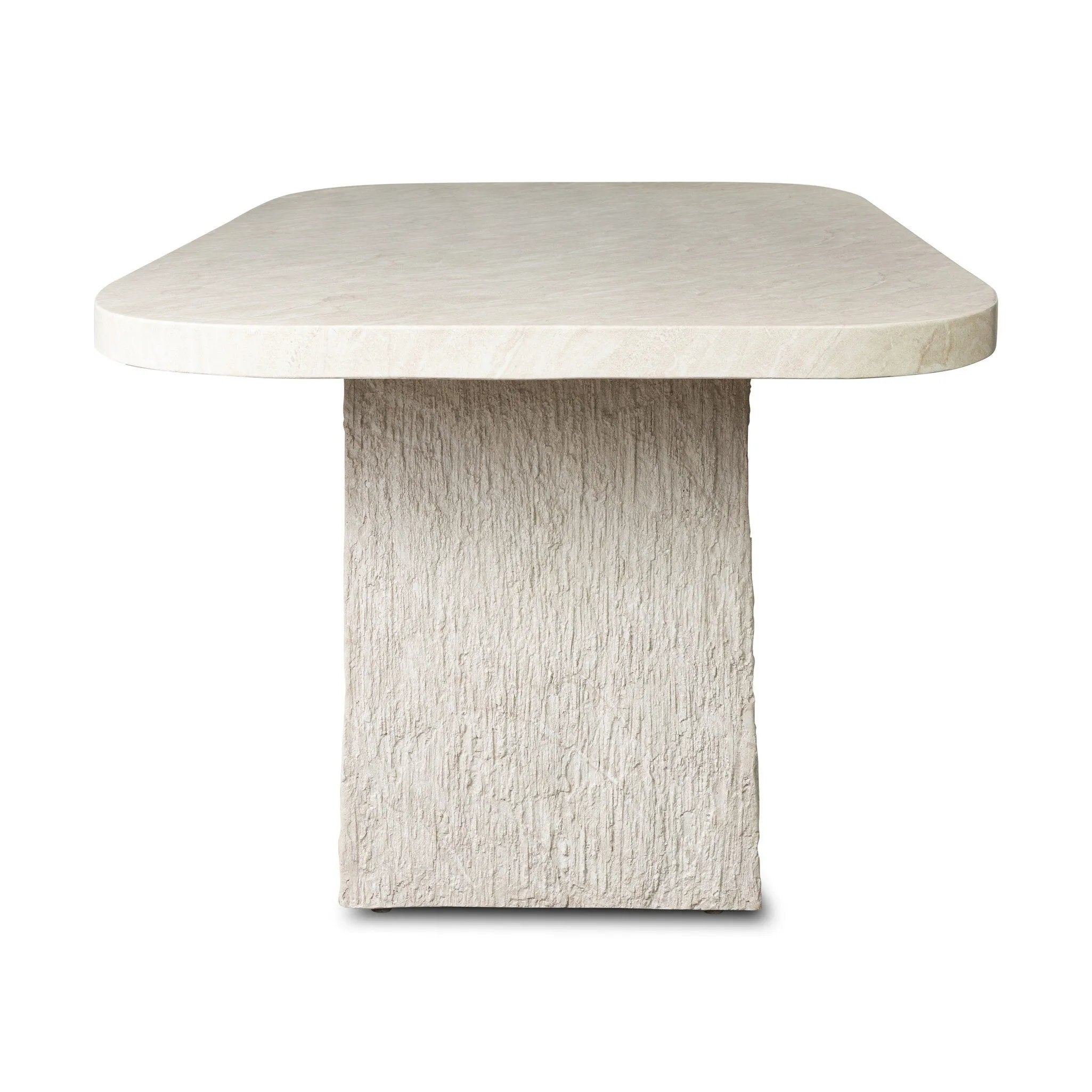 This outdoor dining table features a double pedestal silhouette that's defined by striking contrast between a smooth, refined top and heavily textured legs for a look that's straight from the quarry. It comes together with a water transfer technique on concrete that mimics natural marble. Amethyst Home provides interior design, new home construction design consulting, vintage area rugs, and lighting in the San Diego metro area.