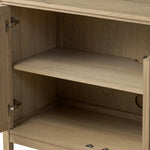 An aged finish plays up oak's natural wood grain, while grid-like patterned doors bring dimension to clean lines. Interior shelving awaits storage of serveware, table linens and more Amethyst Home provides interior design, new home construction design consulting, vintage area rugs, and lighting in the Boston metro area.