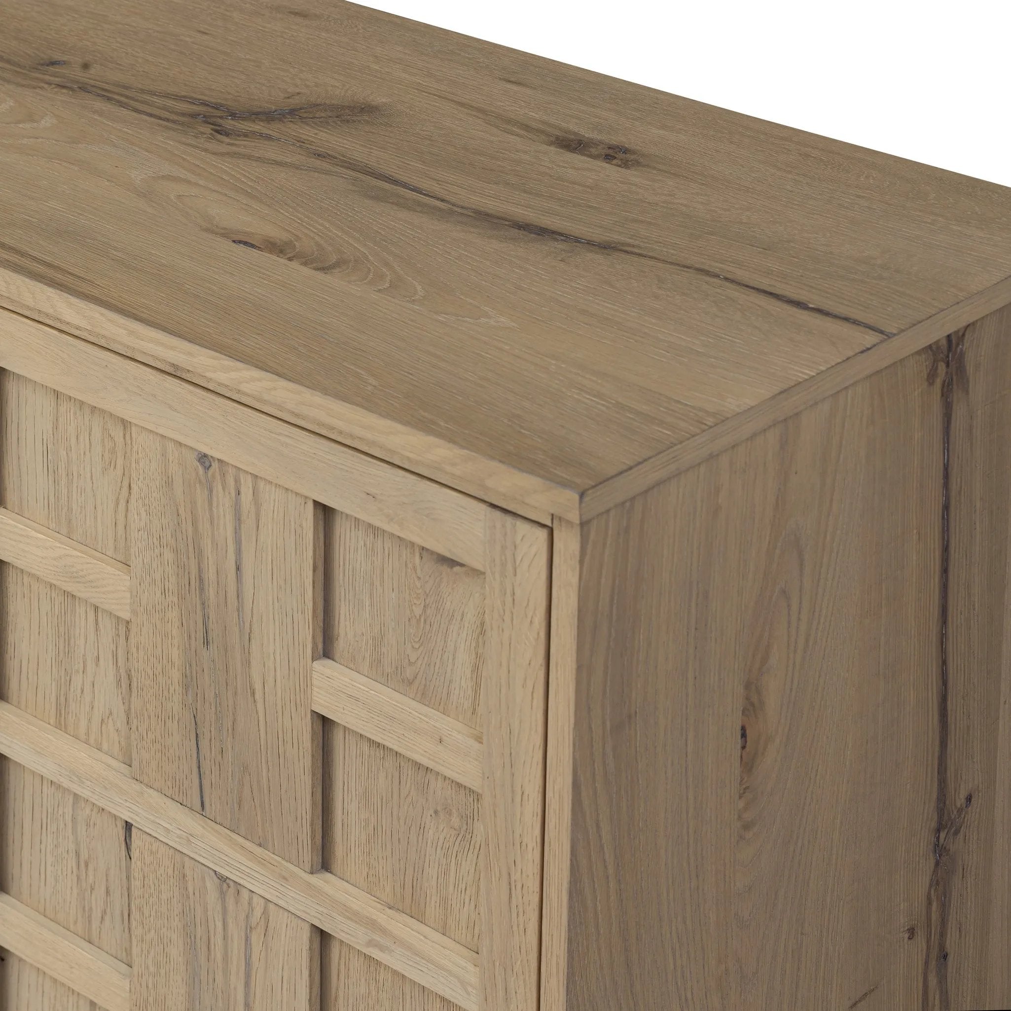 An aged finish plays up oak's natural wood grain, while grid-like patterned doors bring dimension to clean lines. Interior shelving awaits storage of serveware, table linens and more Amethyst Home provides interior design, new home construction design consulting, vintage area rugs, and lighting in the Portland metro area.