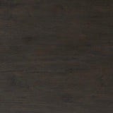 A transitional piece that works into your collection with ease. This solid oak sideboard is finished in a smoked black, highlighting natural graining inherent to rich character woods. Grid-like patterned doors bring dimension to clean, simple shaping, while interior shelving awaits storage of dinnerware, table linens and more. Amethyst Home provides interior design, new home construction design consulting, vintage area rugs, and lighting in the Austin metro area.
