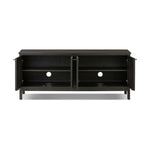A transitional piece that works into your collection with ease. This solid oak sideboard is finished in a smoked black, highlighting natural graining inherent to rich character woods. Grid-like patterned doors bring dimension to clean, simple shaping, while interior shelving awaits storage of dinnerware, table linens and more. Amethyst Home provides interior design, new home construction design consulting, vintage area rugs, and lighting in the Boston metro area.