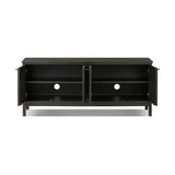 A transitional piece that works into your collection with ease. This solid oak sideboard is finished in a smoked black, highlighting natural graining inherent to rich character woods. Grid-like patterned doors bring dimension to clean, simple shaping, while interior shelving awaits storage of dinnerware, table linens and more. Amethyst Home provides interior design, new home construction design consulting, vintage area rugs, and lighting in the Boston metro area.