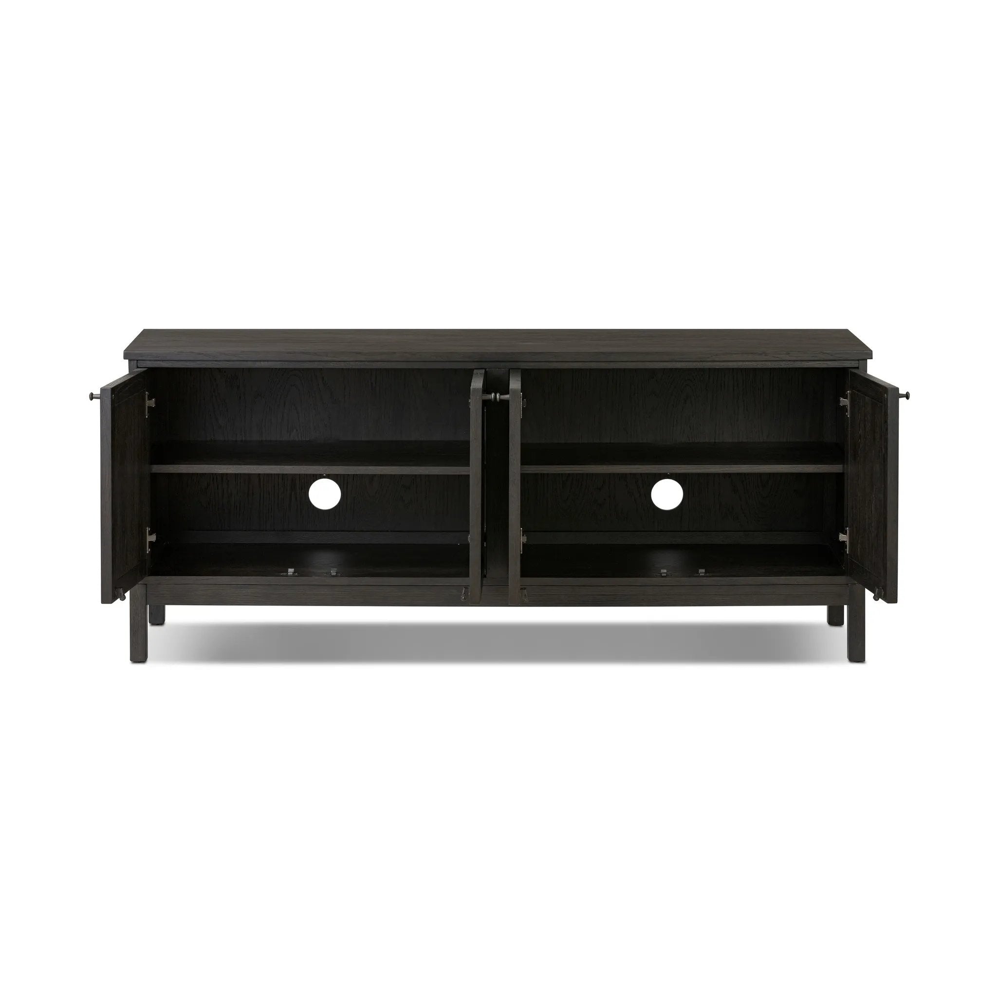 A transitional piece that works into your collection with ease. This solid oak sideboard is finished in a smoked black, highlighting natural graining inherent to rich character woods. Grid-like patterned doors bring dimension to clean, simple shaping, while interior shelving awaits storage of dinnerware, table linens and more. Amethyst Home provides interior design, new home construction design consulting, vintage area rugs, and lighting in the Boston metro area.