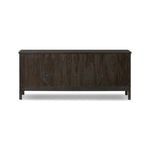 A transitional piece that works into your collection with ease. This solid oak sideboard is finished in a smoked black, highlighting natural graining inherent to rich character woods. Grid-like patterned doors bring dimension to clean, simple shaping, while interior shelving awaits storage of dinnerware, table linens and more. Amethyst Home provides interior design, new home construction design consulting, vintage area rugs, and lighting in the Monterey metro area.