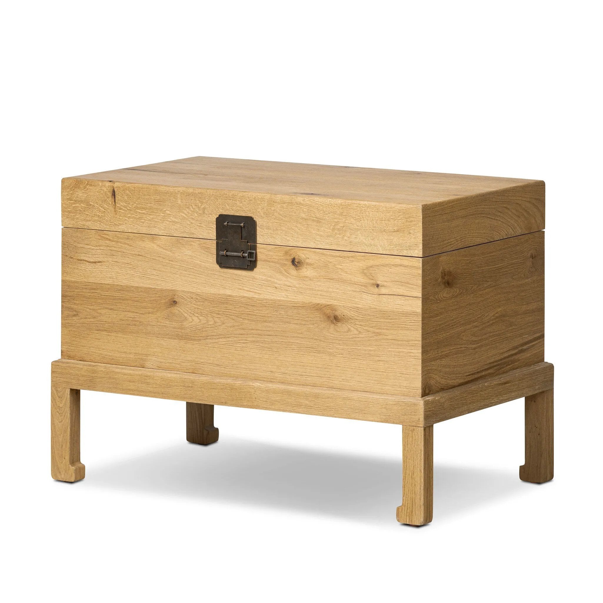 Inspired by classic Chinese antiques, this heritage-style trunk blends timeless design with modern functionality. Crafted from oak with a light, toasted finish, bronzed latch-and-key hardware adds a playful design detail Amethyst Home provides interior design, new home construction design consulting, vintage area rugs, and lighting in the Los Angeles metro area.