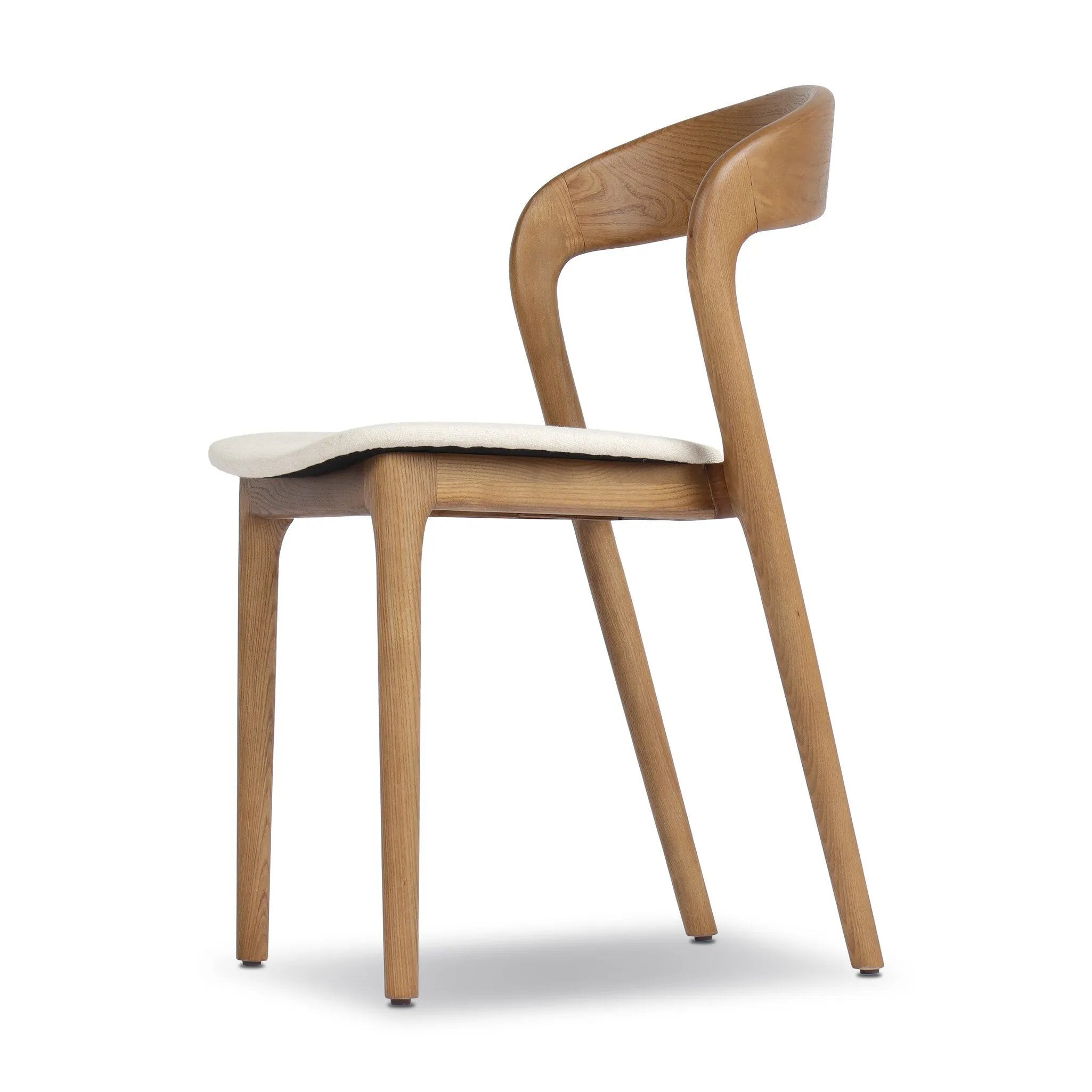 Inspired by clean, simple Scandinavian styling, solid ash forms a shapely, open frame for tan top-grain leather seating in a monochromatic tone Amethyst Home provides interior design, new home construction design consulting, vintage area rugs, and lighting in the Austin metro area.