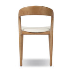 Inspired by clean, simple Scandinavian styling, solid ash forms a shapely, open frame for tan top-grain leather seating in a monochromatic tone Amethyst Home provides interior design, new home construction design consulting, vintage area rugs, and lighting in the Newport Beach metro area.