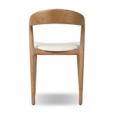 Inspired by clean, simple Scandinavian styling, solid ash forms a shapely, open frame for tan top-grain leather seating in a monochromatic tone Amethyst Home provides interior design, new home construction design consulting, vintage area rugs, and lighting in the Newport Beach metro area.