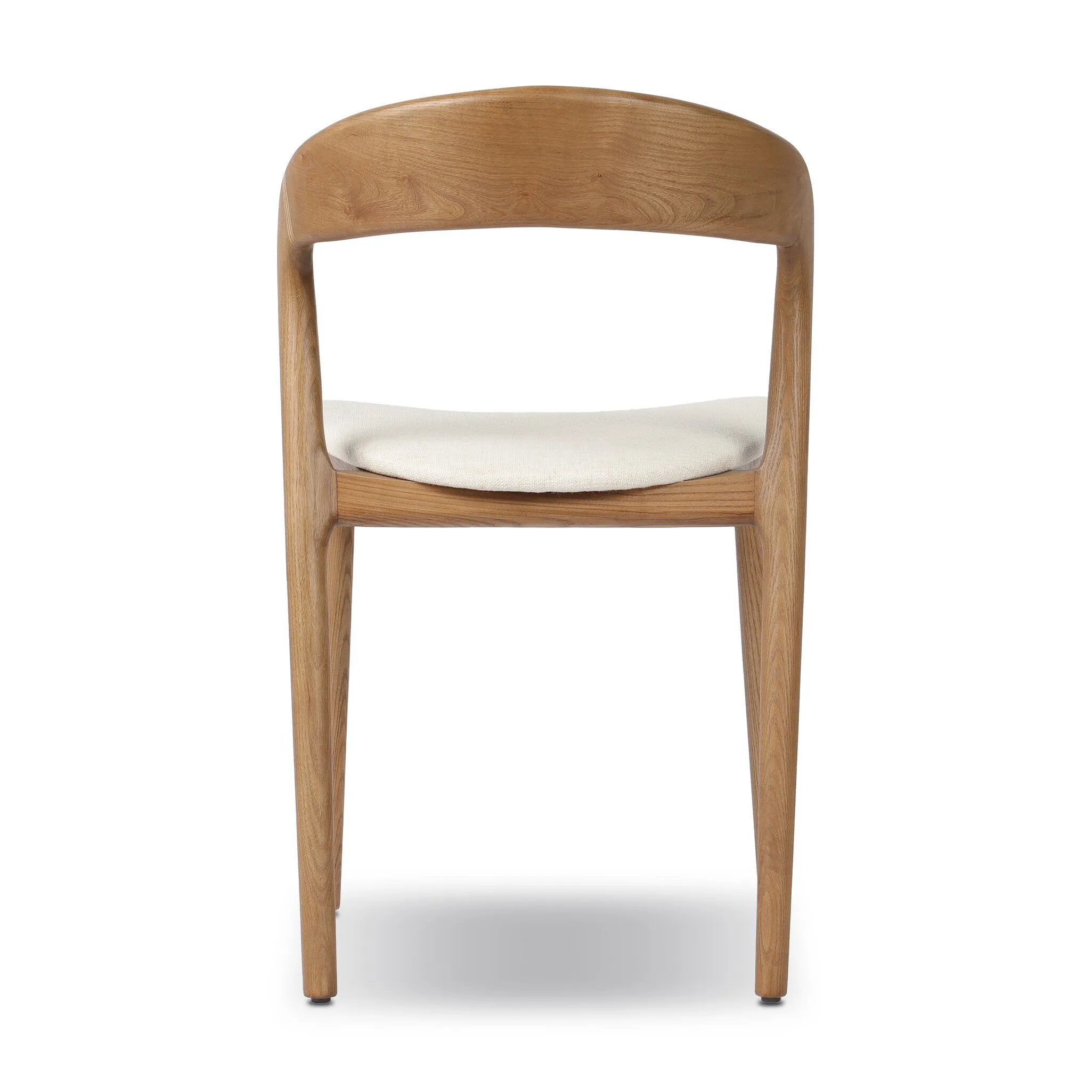 Inspired by clean, simple Scandinavian styling, solid ash forms a shapely, open frame for tan top-grain leather seating in a monochromatic tone Amethyst Home provides interior design, new home construction design consulting, vintage area rugs, and lighting in the Newport Beach metro area.