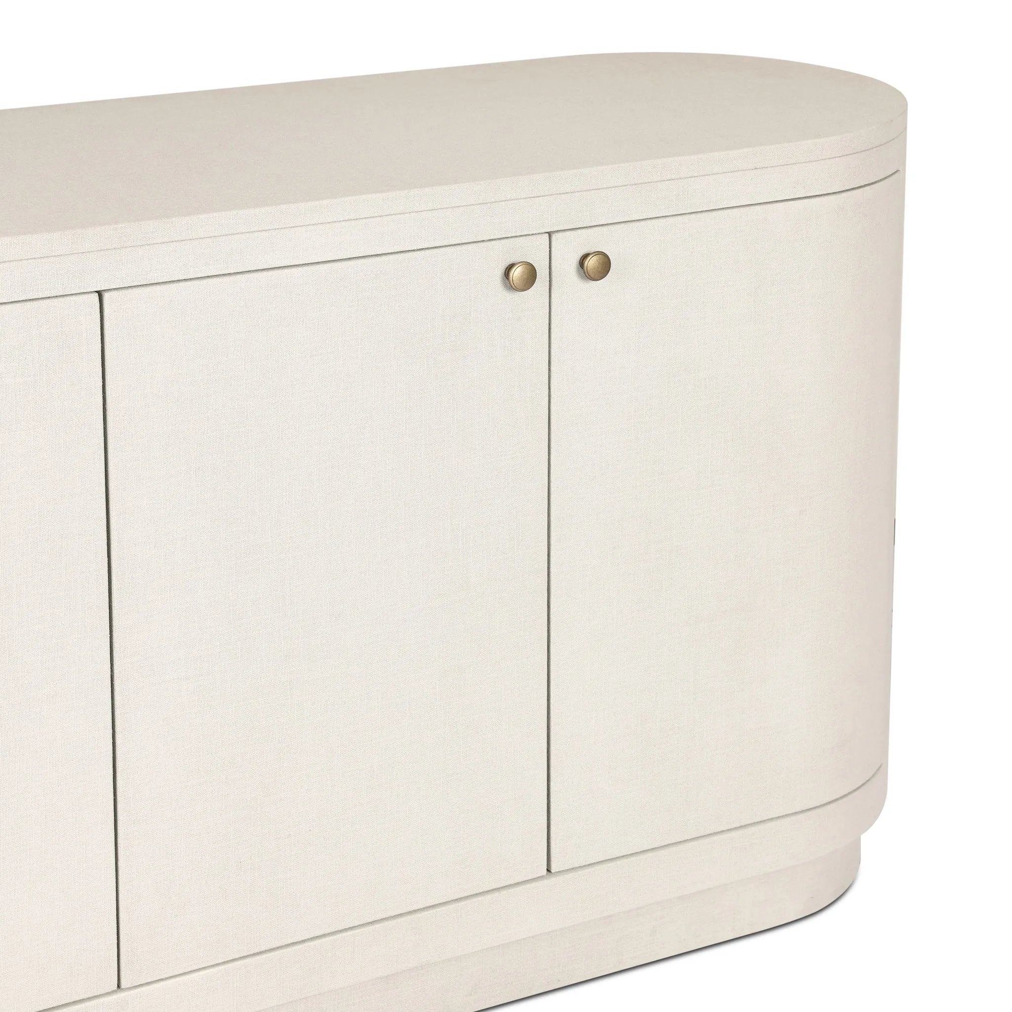 Uniquely made from ivory-painted linen, a beautifully curved sideboard gives shape to generous storage for dinnerware, linens and more Amethyst Home provides interior design, new home construction design consulting, vintage area rugs, and lighting in the Dallas metro area.