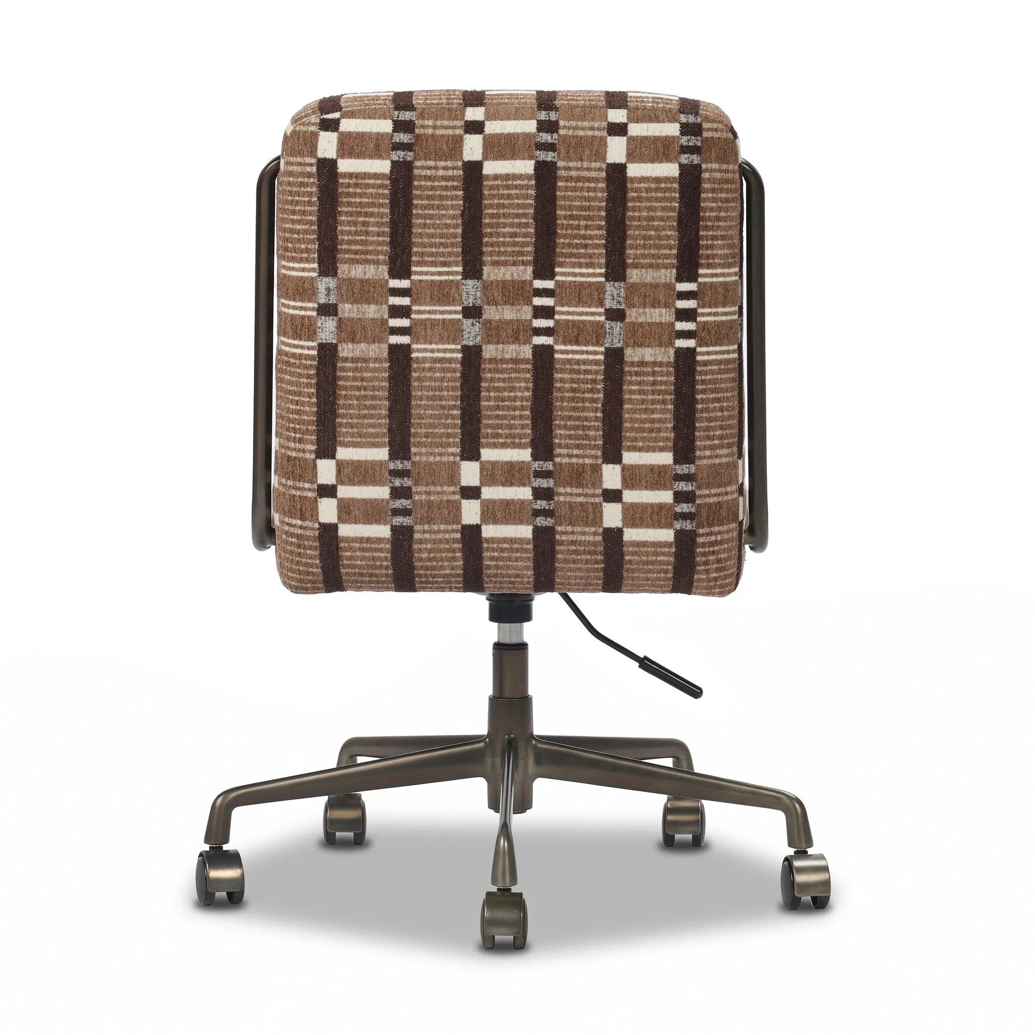 This bold desk chair features a playfully patterned fabric inspired by vintage Swedish textiles that brings any workspace to life. A gunmetal swivel base adds a touch of shine.As lovers of luxe style at Amethyst, we love the optimistic inspired Amos Armless Desk Chair - Sandhill Cocoa. Amethyst Home provides interior design, new home construction design consulting, vintage area rugs, and lighting in the Boston metro area.