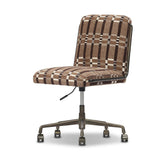This bold desk chair features a playfully patterned fabric inspired by vintage Swedish textiles that brings any workspace to life. A gunmetal swivel base adds a touch of shine.As lovers of luxe style at Amethyst, we love the optimistic inspired Amos Armless Desk Chair - Sandhill Cocoa. Amethyst Home provides interior design, new home construction design consulting, vintage area rugs, and lighting in the Omaha metro area.