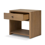 Crafted from sandy solid oak in a waterfall silhouette, this nightstand adds a touch of contemporary simplicity to the bedside. Stack your favorite books on a spacious bottom shelf. The piece’s bullnose edge and oval iron drawer pull add variety. Amethyst Home provides interior design, new home construction design consulting, vintage area rugs, and lighting in the Kansas City metro area.