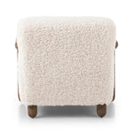 This versatile accent chair is upholstered in a faux Mongolian shearling with a textural high pile. A contrasting, chunky parawood frame hugs the seat and is wire-brushed for a warm, vintage feel.Collection: Kensingto Amethyst Home provides interior design, new home construction design consulting, vintage area rugs, and lighting in the Kansas City metro area.