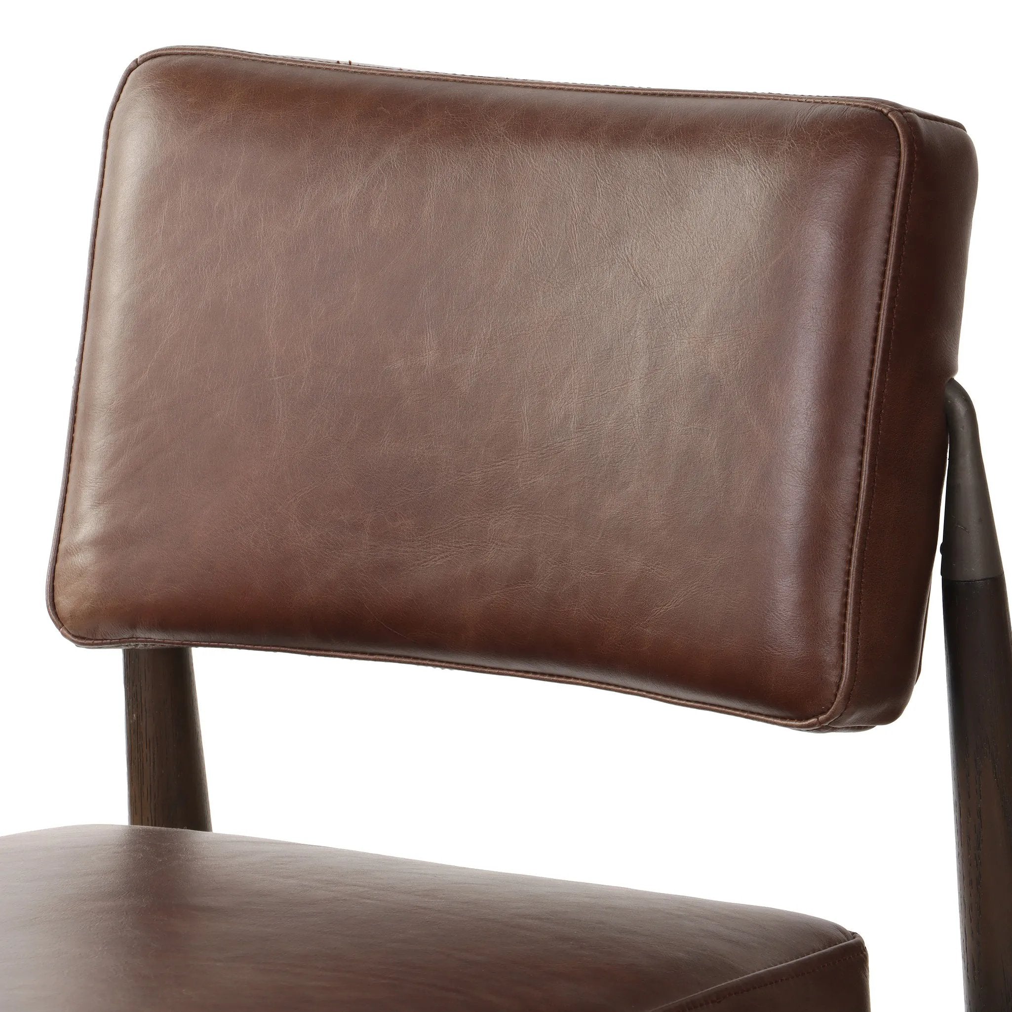 Featuring Anton Havana Brown  Bar + Counter Stool by Four Hands at Amethyst Home. Eighties inspiration gone modern. With iron-dipped caps, tapered legs of solid oak frame this counter stool's seat and back, upholstered in brown top-grain leather. Slim wood stretchers add an airy vibe.BarOverall Dimensions: 20.00"w x 23.75"d x 42.75"hWeight: 18.08 lbsCounte. Amethyst Home provides interior design, new home construction design consulting, vintage area rugs, and lighting in the Des Moines metro area.
