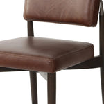 Featuring Anton Havana Brown  Bar + Counter Stool by Four Hands at Amethyst Home. Eighties inspiration gone modern. With iron-dipped caps, tapered legs of solid oak frame this counter stool's seat and back, upholstered in brown top-grain leather. Slim wood stretchers add an airy vibe.BarOverall Dimensions: 20.00"w x 23.75"d x 42.75"hWeight: 18.08 lbsCount. Amethyst Home provides interior design, new home construction design consulting, vintage area rugs, and lighting in the Kansas City metro area.