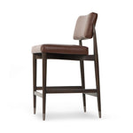 Featuring Anton Havana Brown  Bar + Counter Stool by Four Hands at Amethyst Home. Eighties inspiration gone modern. With iron-dipped caps, tapered legs of solid oak frame this counter stool's seat and back, upholstered in brown top-grain leather. Slim wood stretchers add an airy vibe.BarOverall Dimensions: 20.00"w x 23.75"d x 42.75"hWeight: 18.08 lbsCounte. Amethyst Home provides interior design, new home construction design consulting, vintage area rugs, and lighting in the Washington metro area.