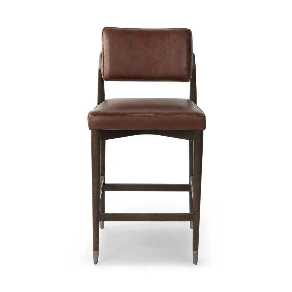 Featuring Anton Havana Brown Counter Stool by Four Hands at Amethyst Home. Crafted with a sleek Havana Brown finish, the Anton Bar + Counter Stool adds a touch of elegance to any space. The sturdy construction and ergonomic design provide exceptional support, making it suitable for extended use. Perfect for both bar and counter heights, this versatile stool is . Amethyst Home provides interior design, new home construction design consulting, vintage area rugs, and lighting in the Tampa metro area.
