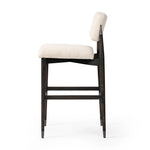 Featuring Anton Savile Flax Bar + Counter Stool by Four Hands at Amethyst Home. Eighties inspiration gone modern. With iron-dipped caps, tapered legs of solid oak frame this bar stool's seat and back, upholstered in light performance fabric. Slim wood stretchers add an airy vibe to this counter stool. Performance fabrics are specially created to withstand s. Amethyst Home provides interior design, new home construction design consulting, vintage area rugs, and lighting in the Charlotte metro area.