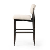 Featuring Anton Savile Flax Bar + Counter Stool by Four Hands at Amethyst Home. Eighties inspiration gone modern. With iron-dipped caps, tapered legs of solid oak frame this bar stool's seat and back, upholstered in light performance fabric. Slim wood stretchers add an airy vibe to this counter stool. Performance fabrics are specially created to withstand s. Amethyst Home provides interior design, new home construction design consulting, vintage area rugs, and lighting in the Charlotte metro area.