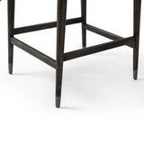 Featuring Anton Savile Flax Bar + Counter Stool by Four Hands at Amethyst Home. Eighties inspiration gone modern. With iron-dipped caps, tapered legs of solid oak frame this bar stool's seat and back, upholstered in light performance fabric. Slim wood stretchers add an airy vibe to this counter stool. Performance fabrics are specially created to withstand spill. Amethyst Home provides interior design, new home construction design consulting, vintage area rugs, and lighting in the Omaha metro area.
