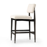 Featuring Anton Savile Flax Bar + Counter Stool by Four Hands at Amethyst Home. Eighties inspiration gone modern. With iron-dipped caps, tapered legs of solid oak frame this bar stool's seat and back, upholstered in light performance fabric. Slim wood stretchers add an airy vibe to this counter stool. Performance fabrics are specially created to withstand s. Amethyst Home provides interior design, new home construction design consulting, vintage area rugs, and lighting in the Park City metro area.