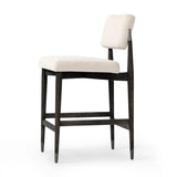Featuring Anton Savile Flax Bar + Counter Stool by Four Hands at Amethyst Home. Eighties inspiration gone modern. With iron-dipped caps, tapered legs of solid oak frame this bar stool's seat and back, upholstered in light performance fabric. Slim wood stretchers add an airy vibe to this counter stool. Performance fabrics are specially created to withstand s. Amethyst Home provides interior design, new home construction design consulting, vintage area rugs, and lighting in the Park City metro area.