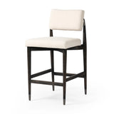 Featuring Anton Savile Flax Bar + Counter Stool by Four Hands at Amethyst Home. Eighties inspiration gone modern. With iron-dipped caps, tapered legs of solid oak frame this bar stool's seat and back, upholstered in light performance fabric. Slim wood stretchers add an airy vibe to this counter stool. Performance fabrics are specially created to withstand spi. Amethyst Home provides interior design, new home construction design consulting, vintage area rugs, and lighting in the Seattle metro area.