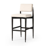 Featuring Anton Savile Flax Bar + Counter Stool by Four Hands at Amethyst Home. Eighties inspiration gone modern. With iron-dipped caps, tapered legs of solid oak frame this bar stool's seat and back, upholstered in light performance fabric. Slim wood stretchers add an airy vibe to this counter stool. Performance fabrics are specially created to withstand spill. Amethyst Home provides interior design, new home construction design consulting, vintage area rugs, and lighting in the Tampa metro area.