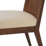Mixed materials refresh a retro style. Cane frames performance fabric seating with slight distressing, bringing more character to the seat. Performance fabrics are specially created to withstand spills, stains, high traffic and wear, ensuring long-term comfort and unmatched durability. Amethyst Home provides interior design, new home construction design consulting, vintage area rugs, and lighting in the Alpharetta metro area.