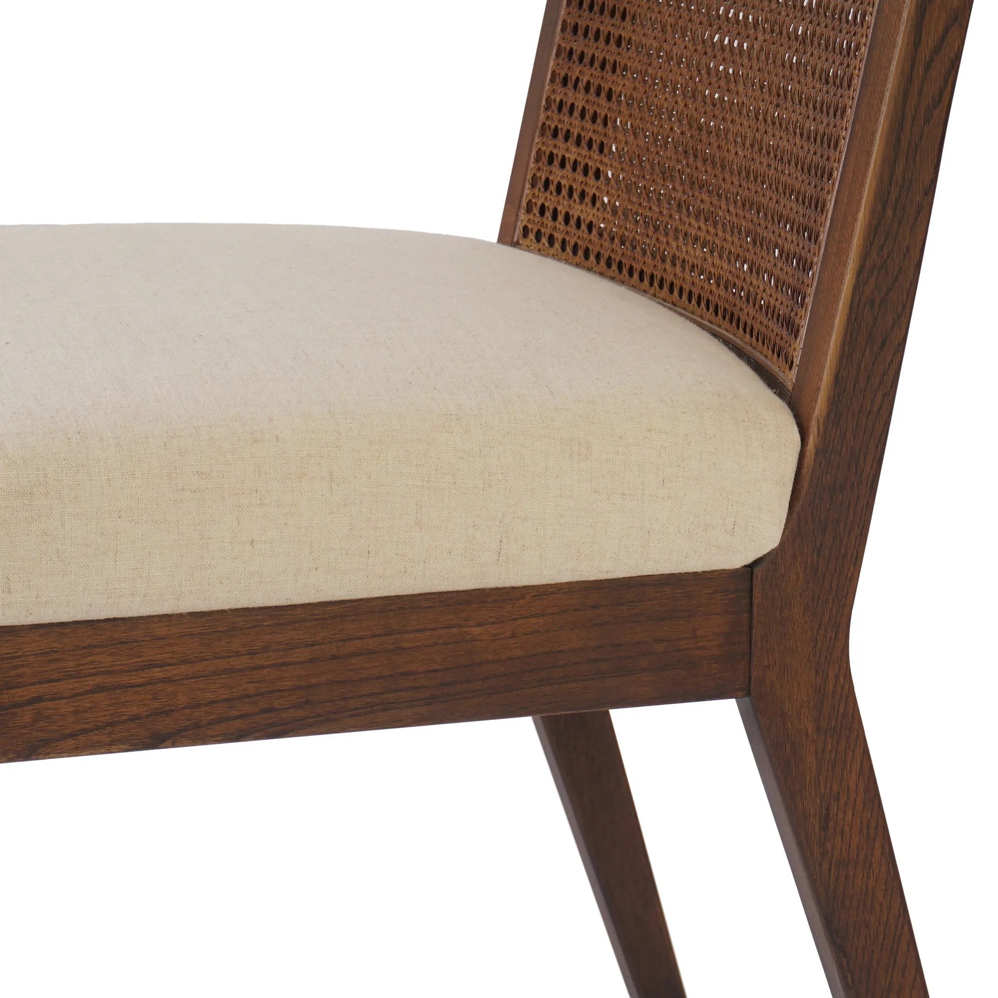 Featuring Antonia Savile Flax Cane Armless Dining Chair by Four Hands at Amethyst Home. Mixed materials refresh a retro style. Cane frames performance fabric seating with slight distressing, bringing more character to the seat. Performance fabrics are specially created to withstand spills, stains, high traffic and wear, ensuring long-term comfort and unmatc. Amethyst Home provides interior design, new home construction design consulting, vintage area rugs, and lighting in the Calabasas metro area.