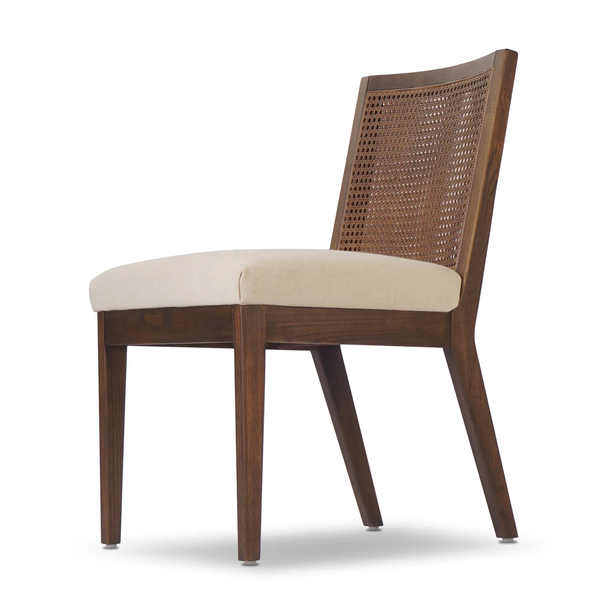 Featuring Antonia Savile Flax Cane Armless Dining Chair by Four Hands at Amethyst Home. Mixed materials refresh a retro style. Cane frames performance fabric seating with slight distressing, bringing more character to the seat. Performance fabrics are specially created to withstand spills, stains, high traffic and wear, ensuring long-term comfort and unmatc. Amethyst Home provides interior design, new home construction design consulting, vintage area rugs, and lighting in the San Diego metro area.
