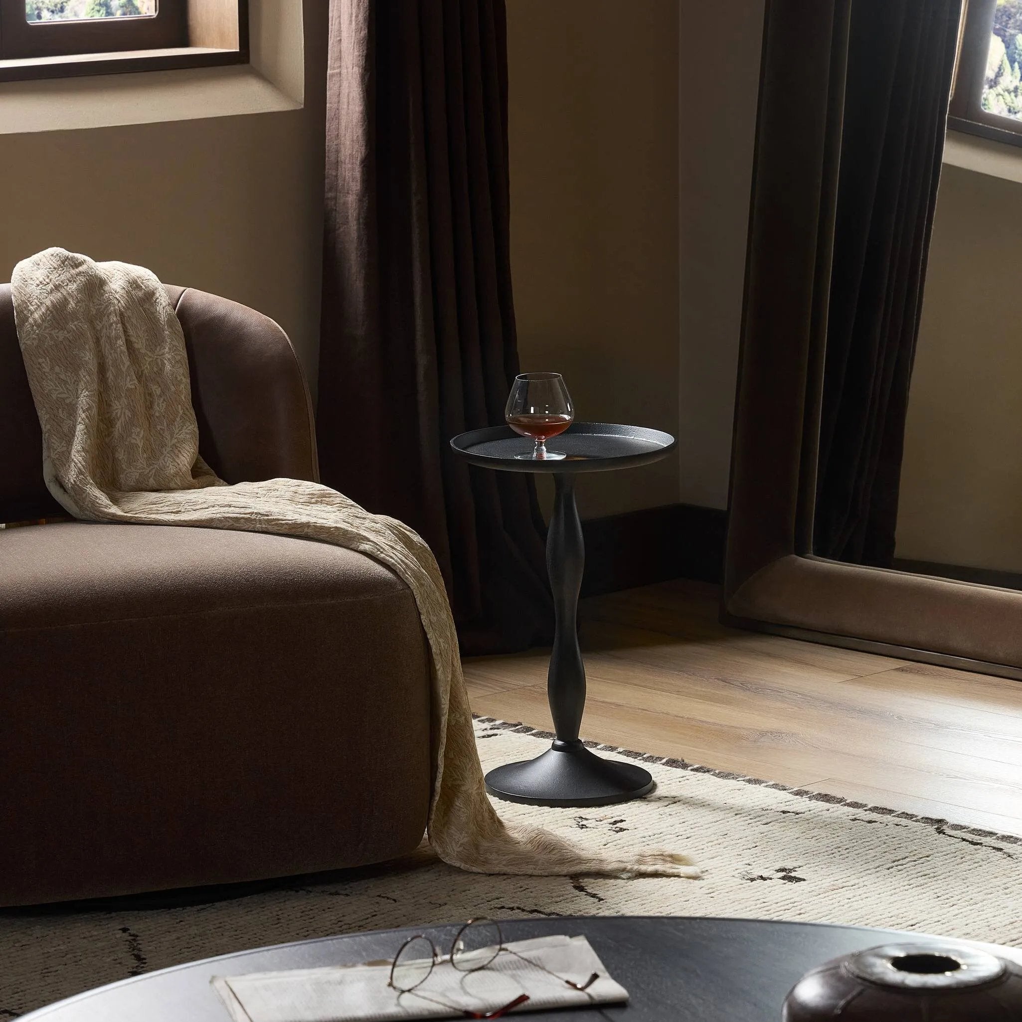 Style this small-scale end table next to any accent chair for a handy extra surface for your favorite drink or book. Made fro