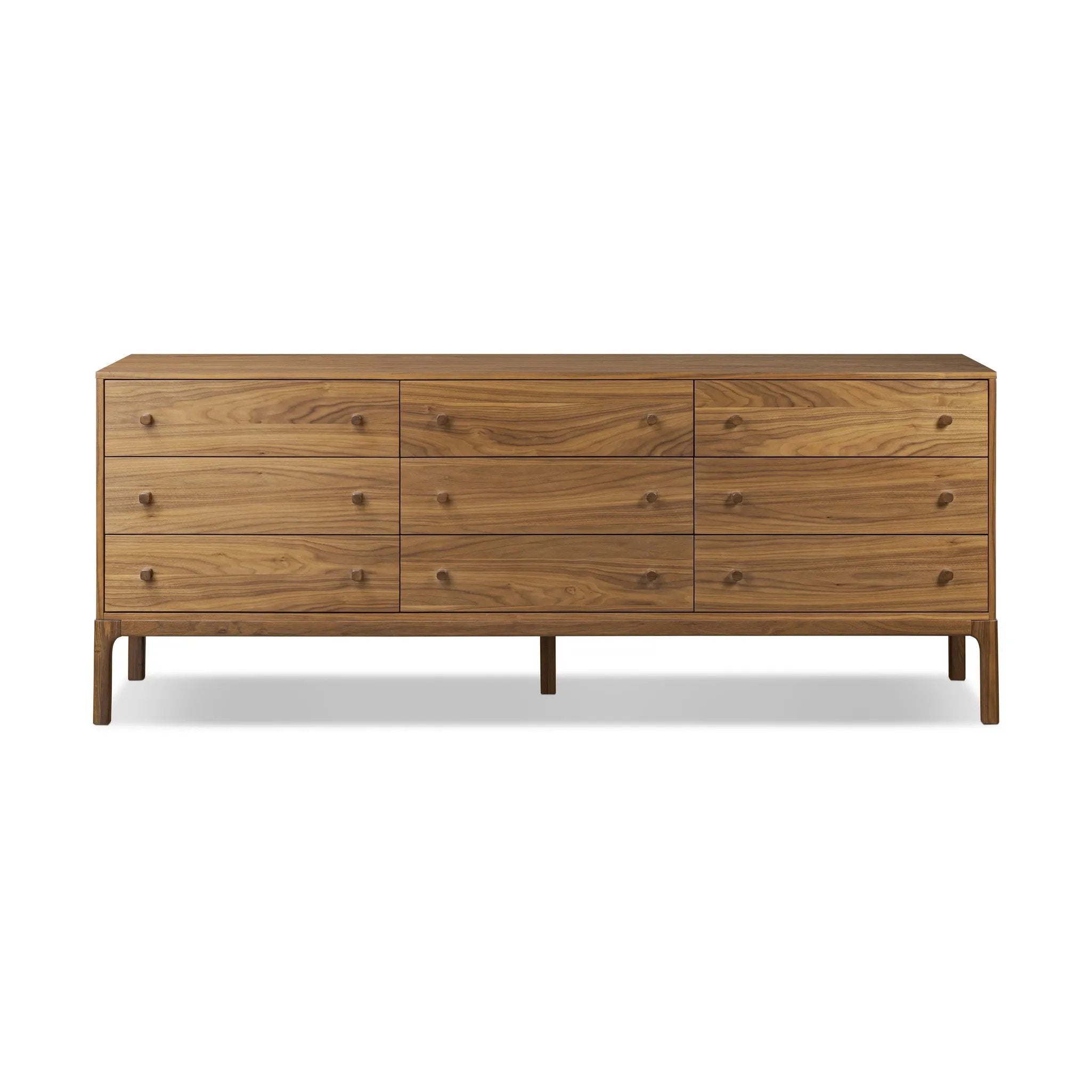 Inspired by campaign-style furniture of the 1800s — packable pieces first designed for traveling military use — a simply shaped dresser of natural walnut features a subtly inset top and rounded legs, finished with wooden hardware. This item has been modified to comply with the STURDY Act. Amethyst Home provides interior design, new home construction design consulting, vintage area rugs, and lighting in the Austin metro area.