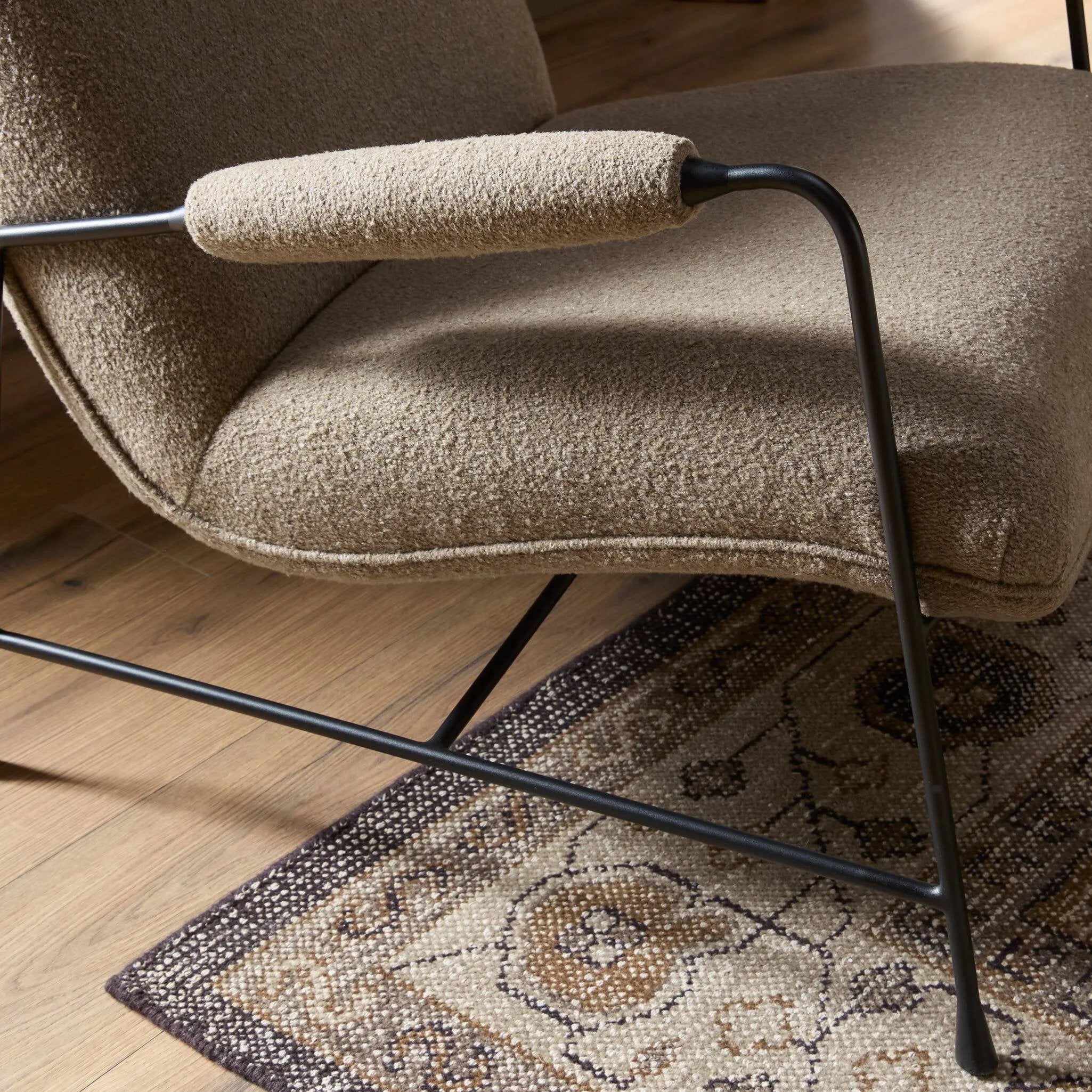 Featuring Ashburn Crete Putty Chair by Four Hands at Amethyst Home. Meet your new favorite chair. Fixed cushioning upholstered in a brushed, textural fabric pairs with a slim steel frame and padded armrests. S-spring suspension and foam cushioning provide lasting support. Overall Dimensions: 28.25"w x 34.25"d x 31.00"h. Amethyst Home provides interior design, new home construction design consulting, vintage area rugs, and lighting in the Washington metro area.