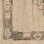Patterned with a simplistic three-emblem motif framed by a narrow border, this hand-knotted wool rug adds just a touch of neutral design. The durable runner is crafted to wear beautifully over time. Due to the handcrafted nature of this rug, slight variations in sizing may occur Amethyst Home provides interior design, new home construction design consulting, vintage area rugs, and lighting in the Charlotte metro area.