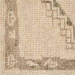 Patterned with a simplistic three-emblem motif framed by a narrow border, this hand-knotted wool rug adds just a touch of neutral design. The durable runner is crafted to wear beautifully over time. Due to the handcrafted nature of this rug, slight variations in sizing may occur Amethyst Home provides interior design, new home construction design consulting, vintage area rugs, and lighting in the Park City metro area.