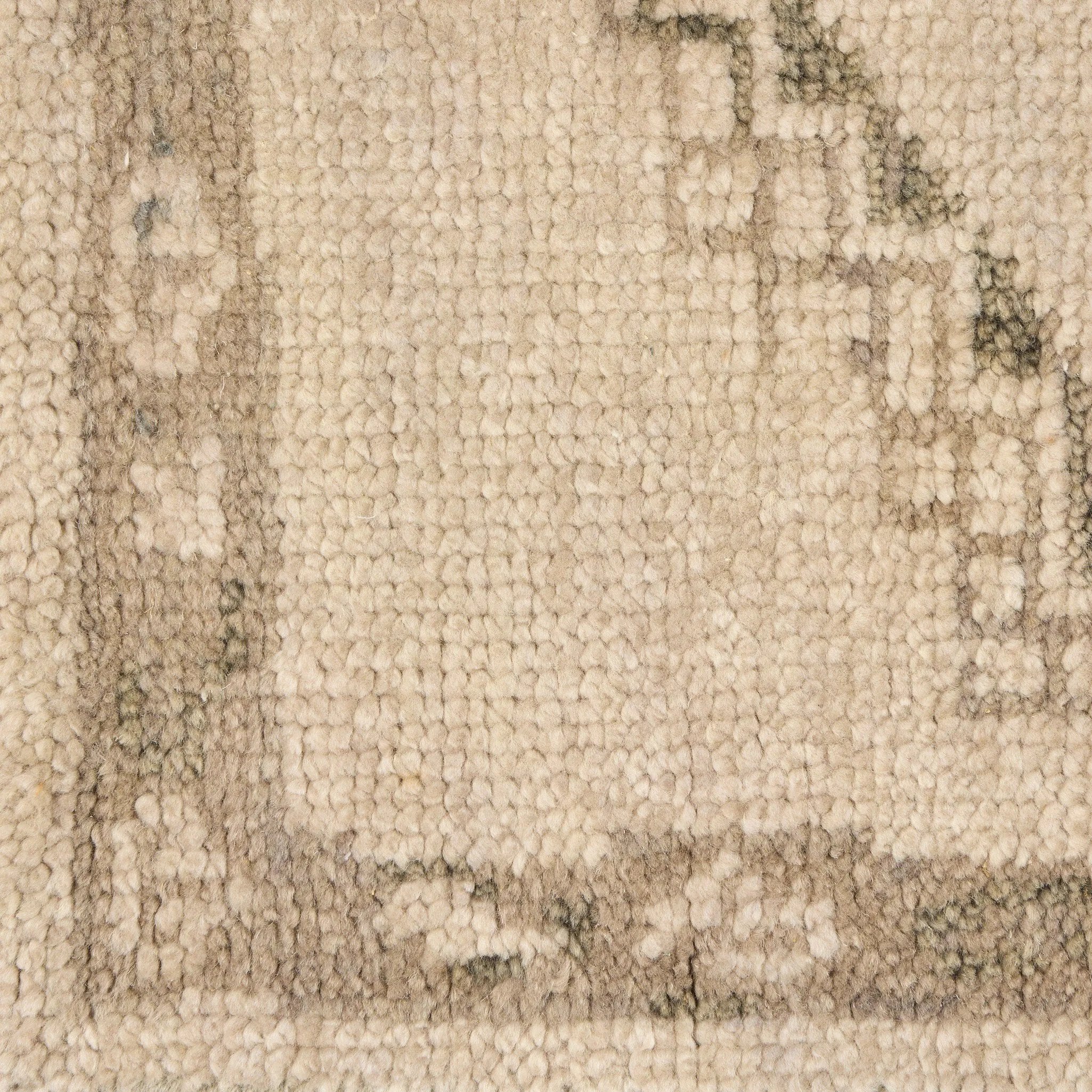 Patterned with a simplistic three-emblem motif framed by a narrow border, this hand-knotted wool rug adds just a touch of neutral design. The durable runner is crafted to wear beautifully over time. Due to the handcrafted nature of this rug, slight variations in sizing may occur Amethyst Home provides interior design, new home construction design consulting, vintage area rugs, and lighting in the Park City metro area.