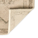 Patterned with a simplistic three-emblem motif framed by a narrow border, this hand-knotted wool rug adds just a touch of neutral design. The durable runner is crafted to wear beautifully over time. Due to the handcrafted nature of this rug, slight variations in sizing may occur Amethyst Home provides interior design, new home construction design consulting, vintage area rugs, and lighting in the Salt Lake City metro area.