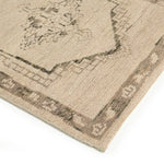 Patterned with a simplistic three-emblem motif framed by a narrow border, this hand-knotted wool rug adds just a touch of neutral design. The durable runner is crafted to wear beautifully over time. Due to the handcrafted nature of this rug, slight variations in sizing may occur Amethyst Home provides interior design, new home construction design consulting, vintage area rugs, and lighting in the Seattle metro area.