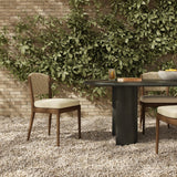 A fresh take on the traditional woven style, this outdoor dining chair features a faux banana leaf material wrapped in a bold, chunky texture around FSC®-certified teak framing. Cover or store indoors during inclement weather and when not in use. Amethyst Home provides interior design, new home construction design consulting, vintage area rugs, and lighting in the Des Moines metro area.