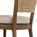 A fresh take on the traditional woven style, this outdoor dining chair features a faux banana leaf material wrapped in a bold, chunky texture around FSC®-certified teak framing. Cover or store indoors during inclement weather and when not in use. Amethyst Home provides interior design, new home construction design consulting, vintage area rugs, and lighting in the Houston metro area.